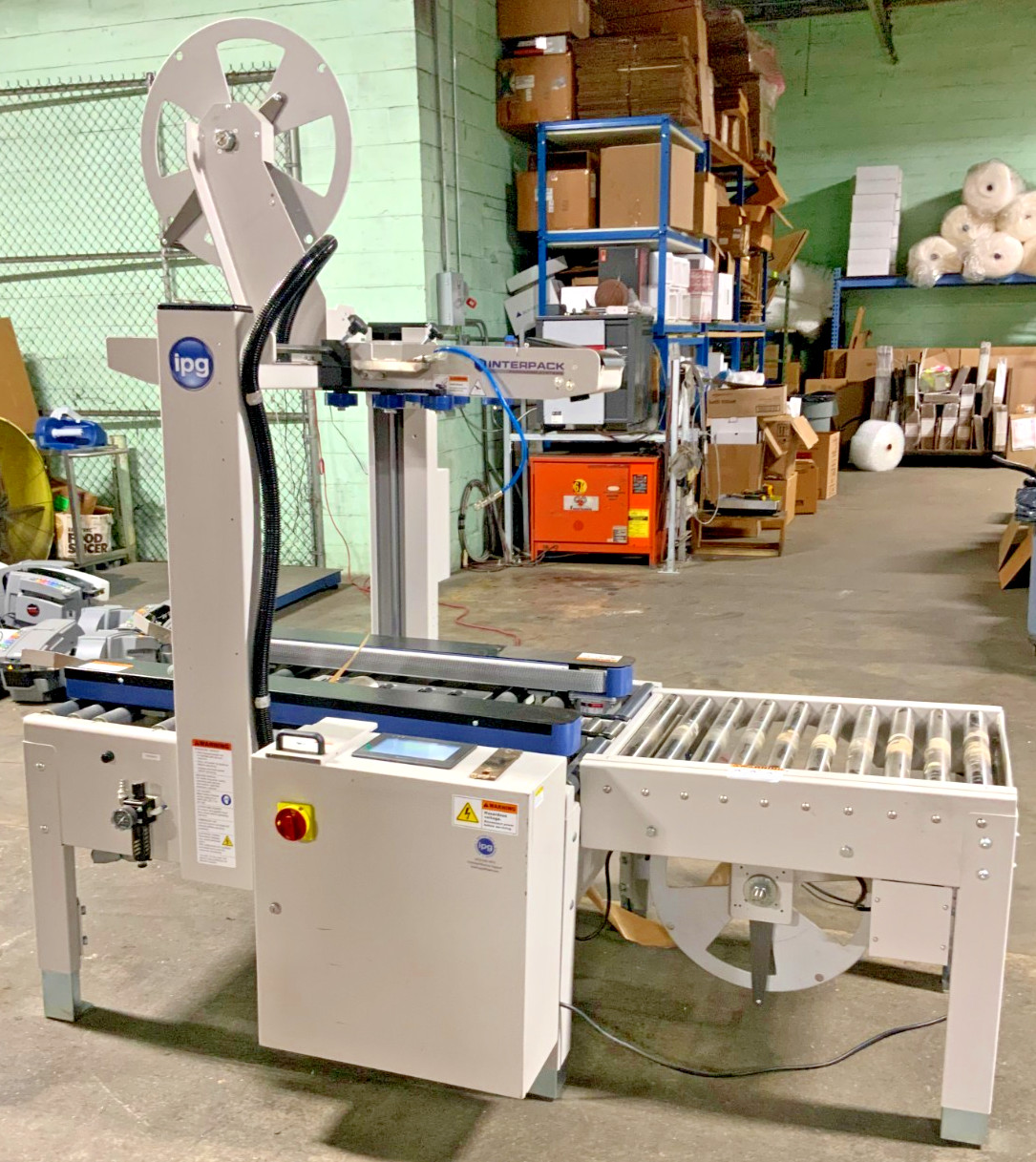 Interpack USA2024-WAT Uniform Semi-Automatic Case Sealer FLR_0 Interpack USA2024-WAT Uniform Semi-Automatic Case Sealer FLR